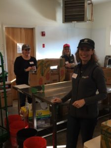 MTI Staff April Finkenhoefer, Martha Bentley, and Emily  Cordray inspecting eggs