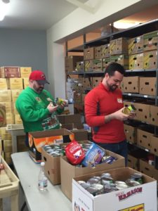 MTI Staff Shane Beckim and Lou Simms sorting and organizing food