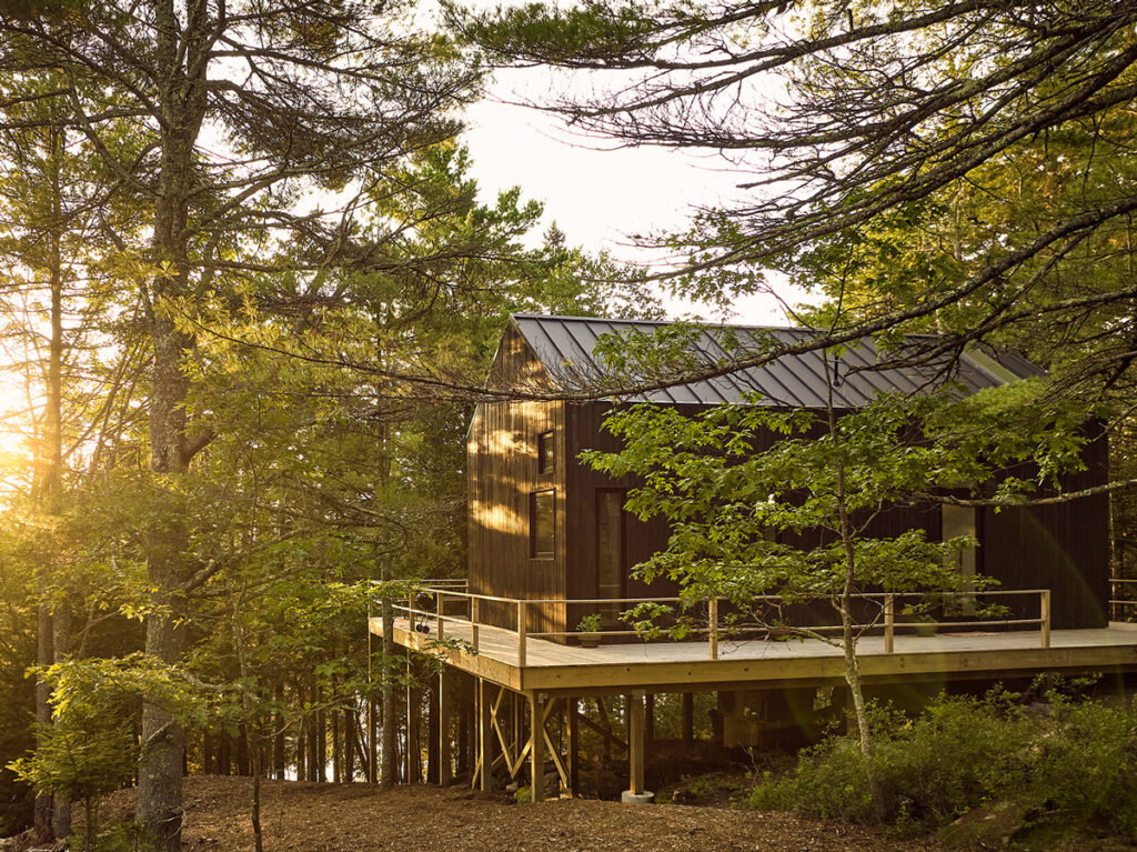 Croft house on raised foundation in woods