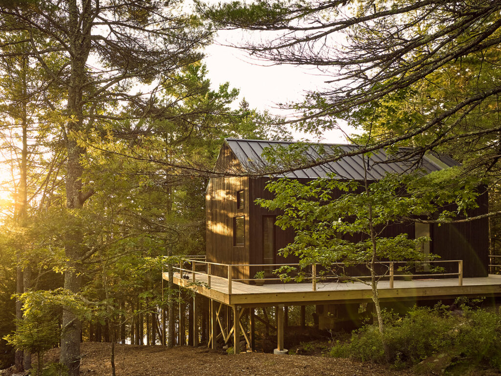 Croft house on raised foundation in woods