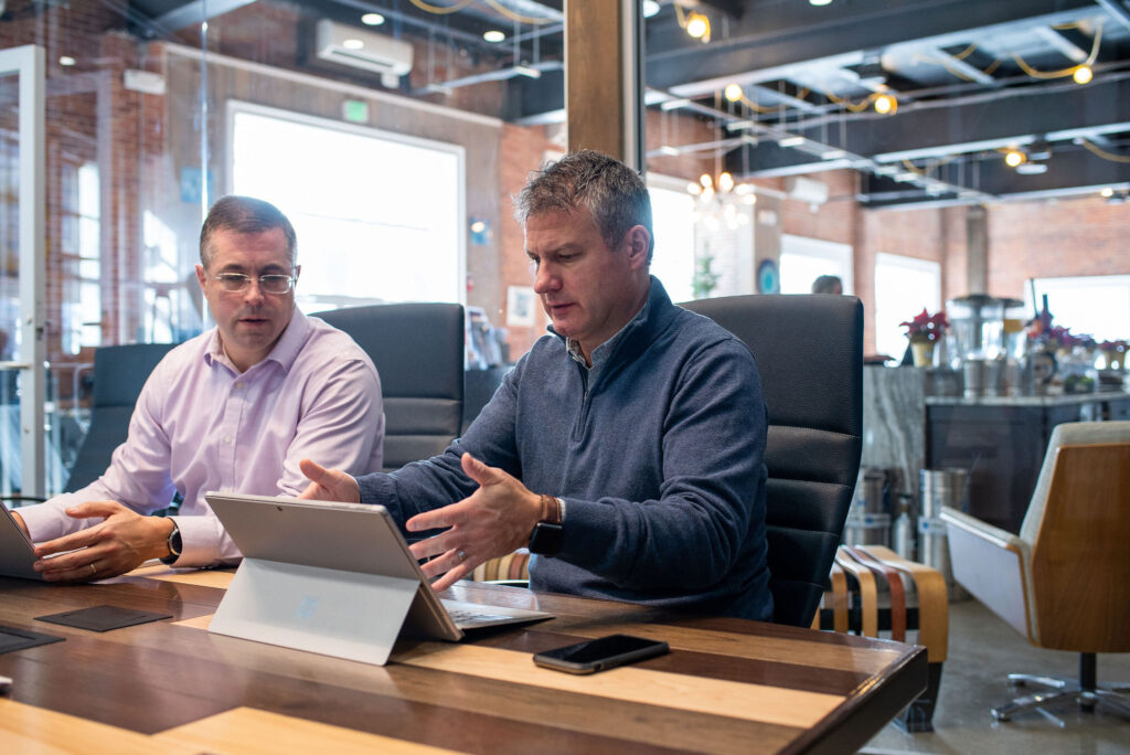 HighByte team working diligently at table in office space