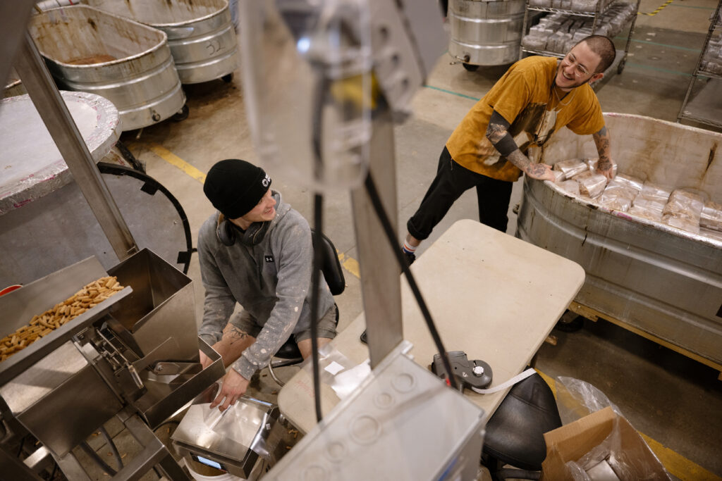 Arial view of workers packing grow kit materials