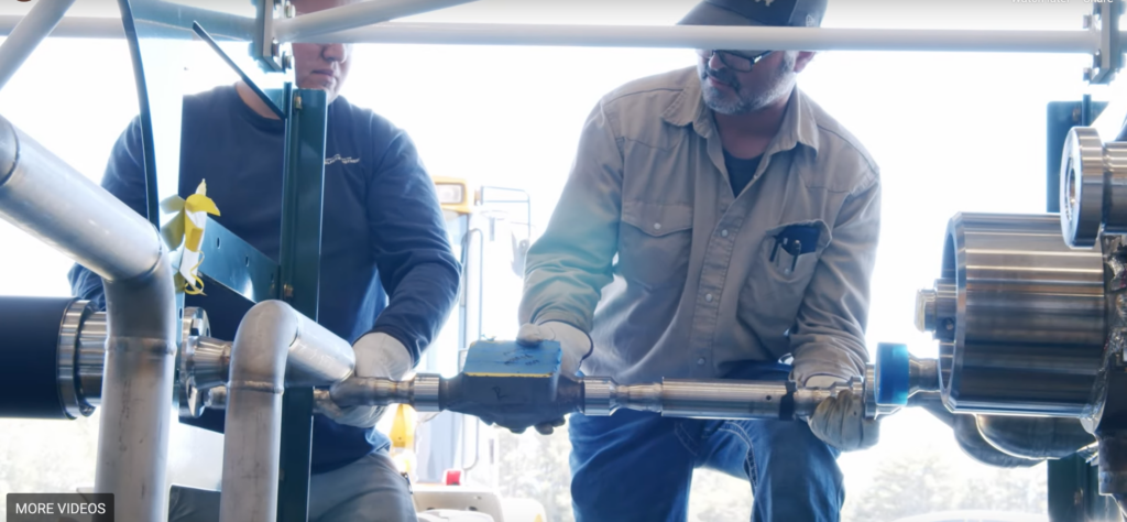 Workers at peregrine turbine technologies, fitting equipment