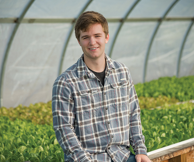 Trevor Kenkel in Springworks greenhouse